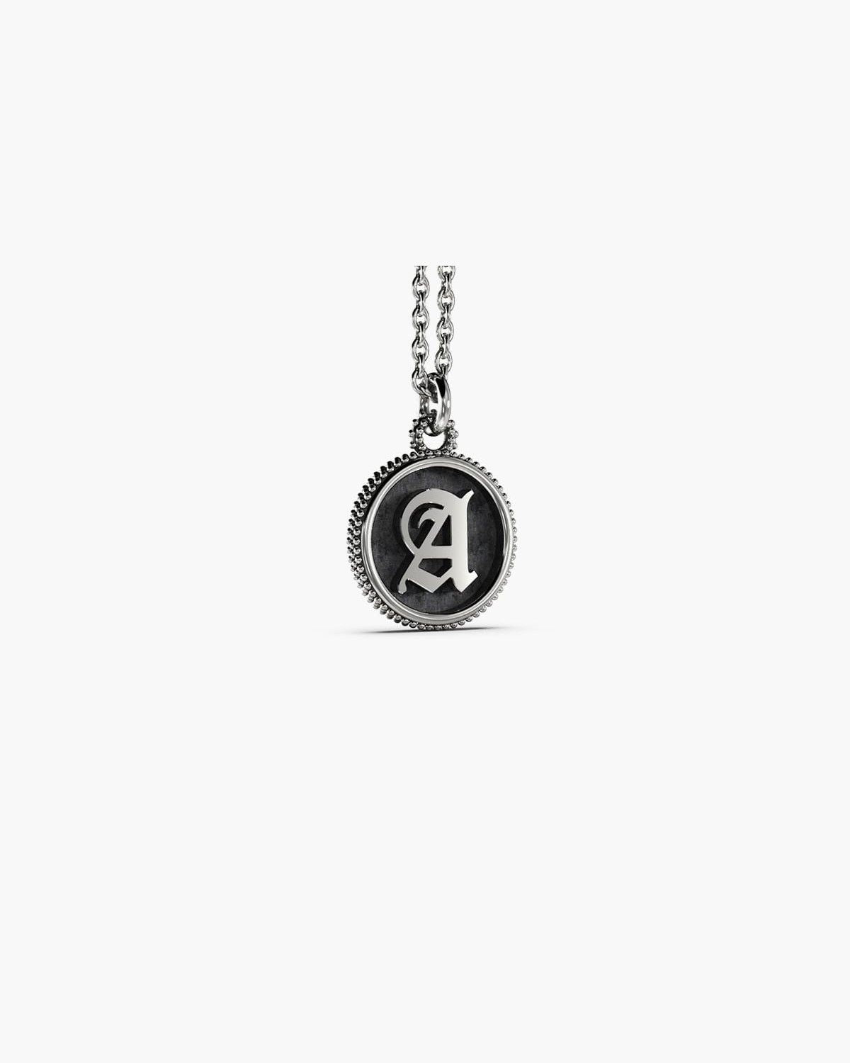 PENDENTIF RONDE À PICOTS AVEC DÉCOR