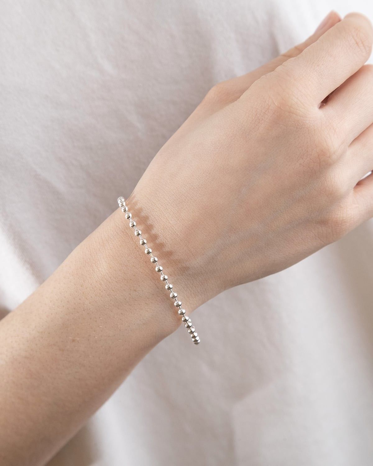 PULSERA ESFERAS 300