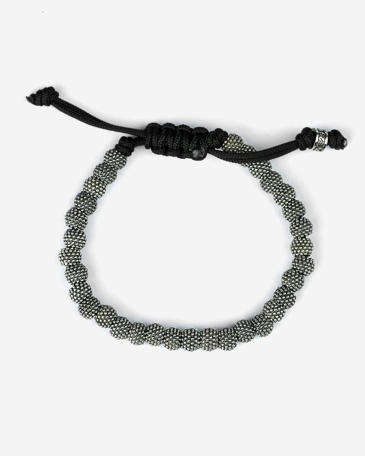BRACELET CORDE ÉLÉMENTS TONDES À PICOTS
