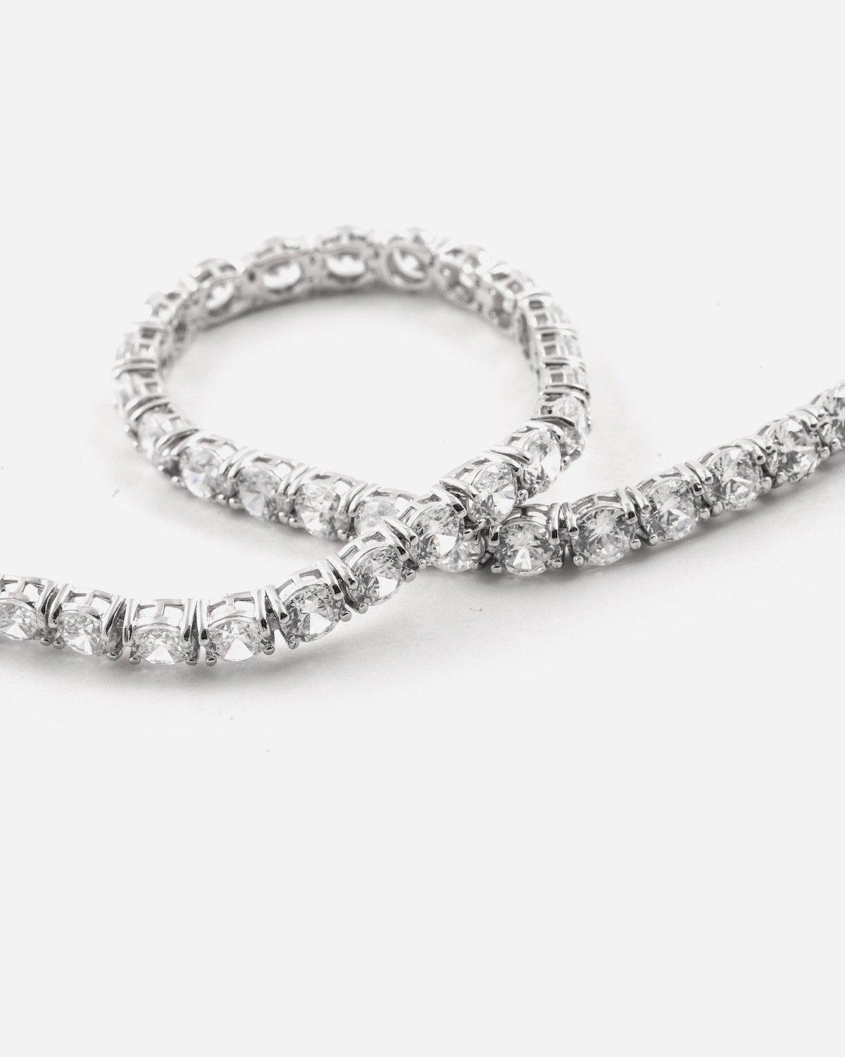 ICY BUDS TENNIS BRACELET WITH WHITE STONES