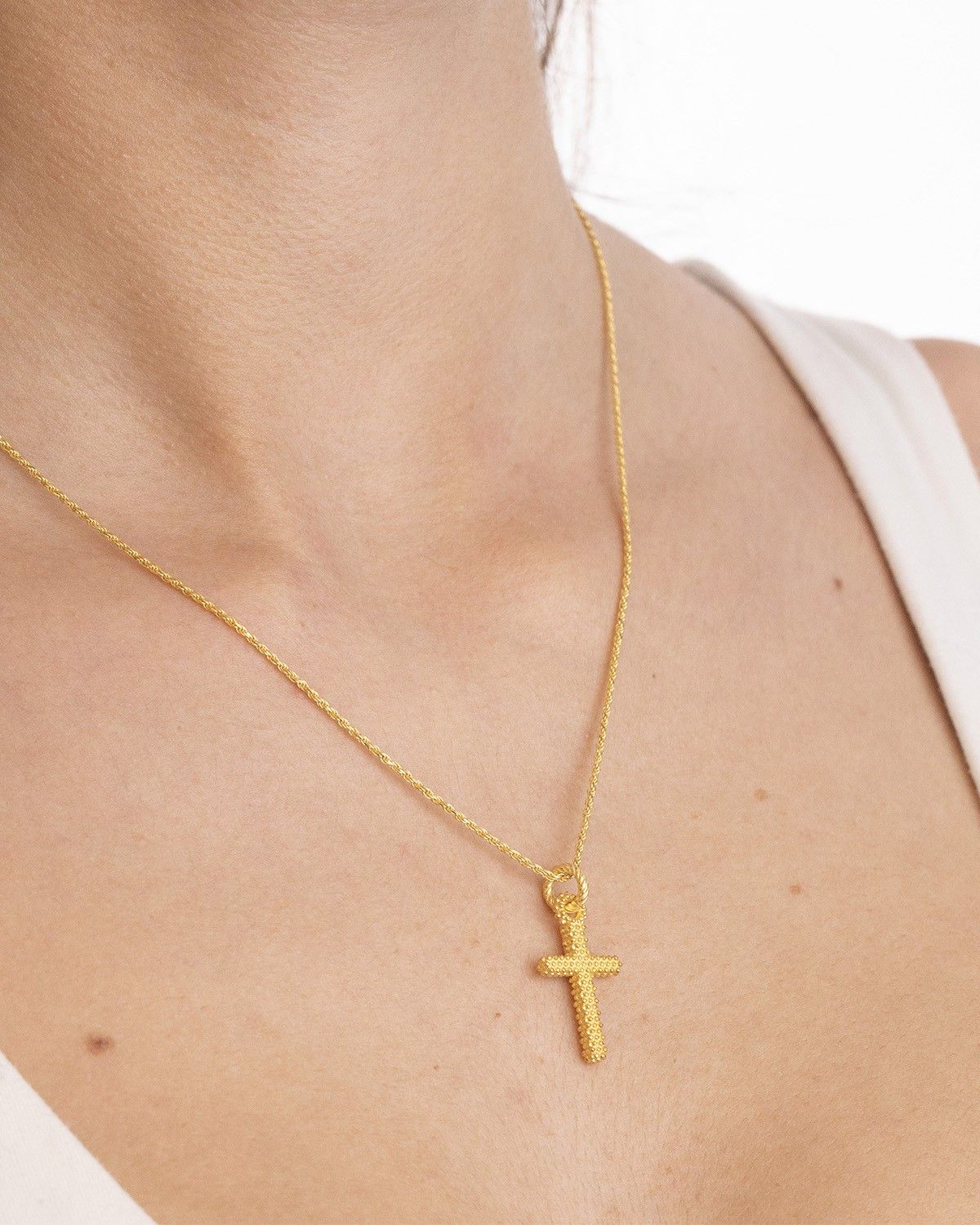 PENDENTIF CROIX À PICOTS PETIT PLAQUÉ OR