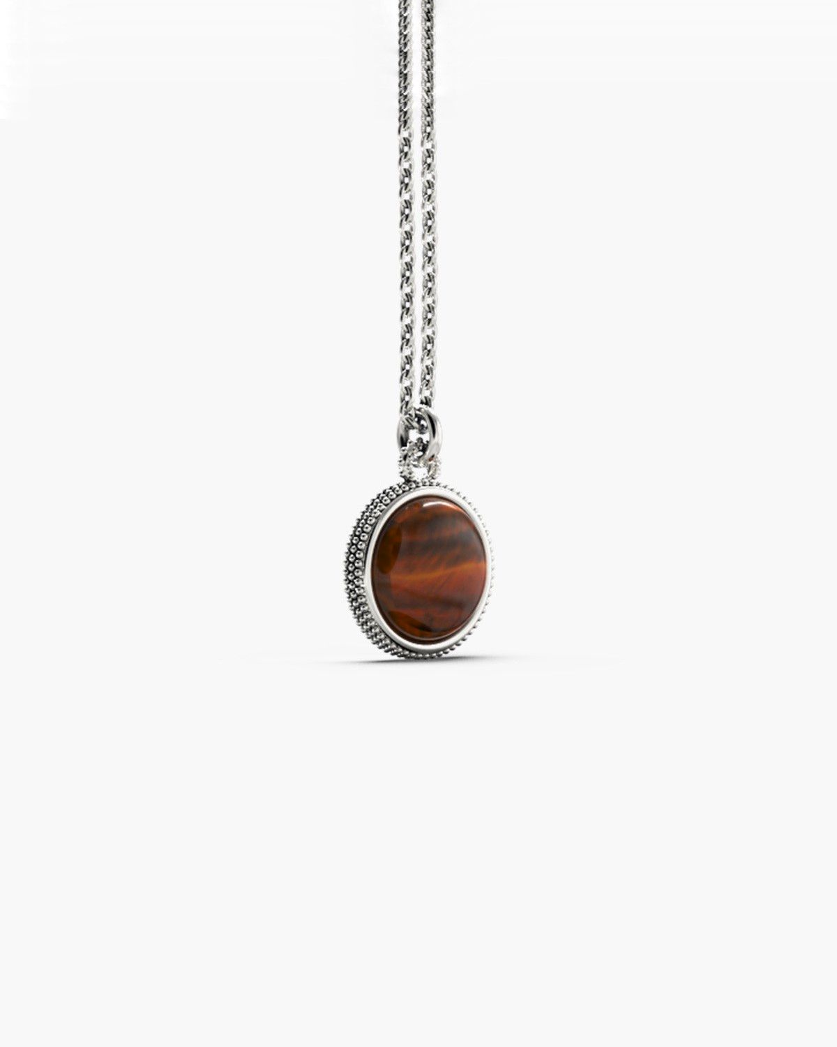 PENDENTIF RONDE À PICOTS AVEC PIERRE